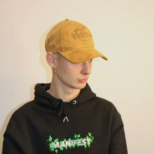 Load image into Gallery viewer, Manifest brown suede cap with embroidered design, combining classic style with modern flair.