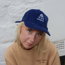 Load image into Gallery viewer, Blue cord cap by Manifest with detailed Dream Catcher embroidery, adding a unique, bohemian touch to your outfit.