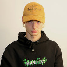 Load image into Gallery viewer, Elegant brown suede cap from Manifest, featuring intricate embroidery for a sophisticated, casual look.