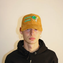 Load image into Gallery viewer, Brown suede cap from Manifest featuring 'Love Where You Live' embroidery, combining style and a positive message.