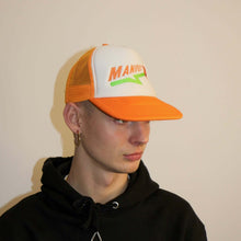 Load image into Gallery viewer, Manifest orange flower trucker hat, combining a bright color with intricate floral embroidery for a unique accessory.