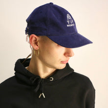 Load image into Gallery viewer, Manifest embroidered Dream Catcher blue cord hat, combining a vibrant design with a comfortable, casual fit.