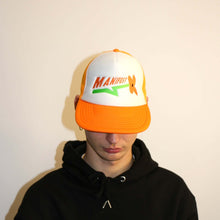 Load image into Gallery viewer, Bright orange trucker hat from Manifest featuring vibrant flower embroidery, adding a pop of color and style.