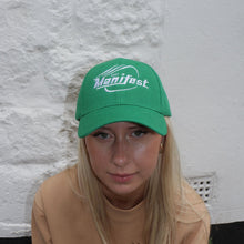 Load image into Gallery viewer, Stylish green embroidered Manifest cap, perfect for casual wear with a bold and unique design.