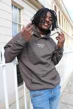 Load image into Gallery viewer, Stylish deep grey hoodie with subtle embroidered design by Manifest, perfect for a modern, minimalist look.