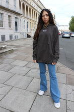 Load image into Gallery viewer, Trendy deep grey hoodie by Manifest with unique embroidery, designed for a fashionable and cozy vibe.