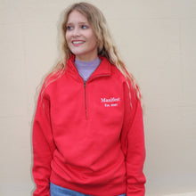 Load image into Gallery viewer, Woman wearing a red cotton 1/4 zip sweatshirt with embroidered Manifest logo, casual and stylish attire.