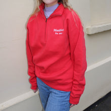 Load image into Gallery viewer, Comfortable red cotton 1/4 zip sweatshirt with embroidered Manifest logo worn by a model in casual outfit.