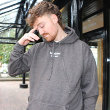 Load image into Gallery viewer, Classic deep grey hoodie from Manifest, featuring embroidered accents for a sophisticated casual look.