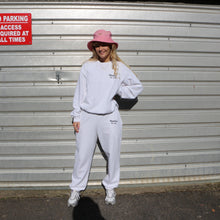 Load image into Gallery viewer, Stylish white Manifest joggers made from soft cotton, perfect for casual wear or athleisure looks.