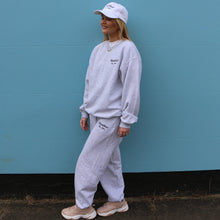 Load image into Gallery viewer, Grey cotton jogger bottoms from Manifest featuring detailed embroidery, offering a comfortable and stylish casual look.