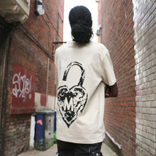 Load image into Gallery viewer, Manifest Heart on lock beige t shirt
